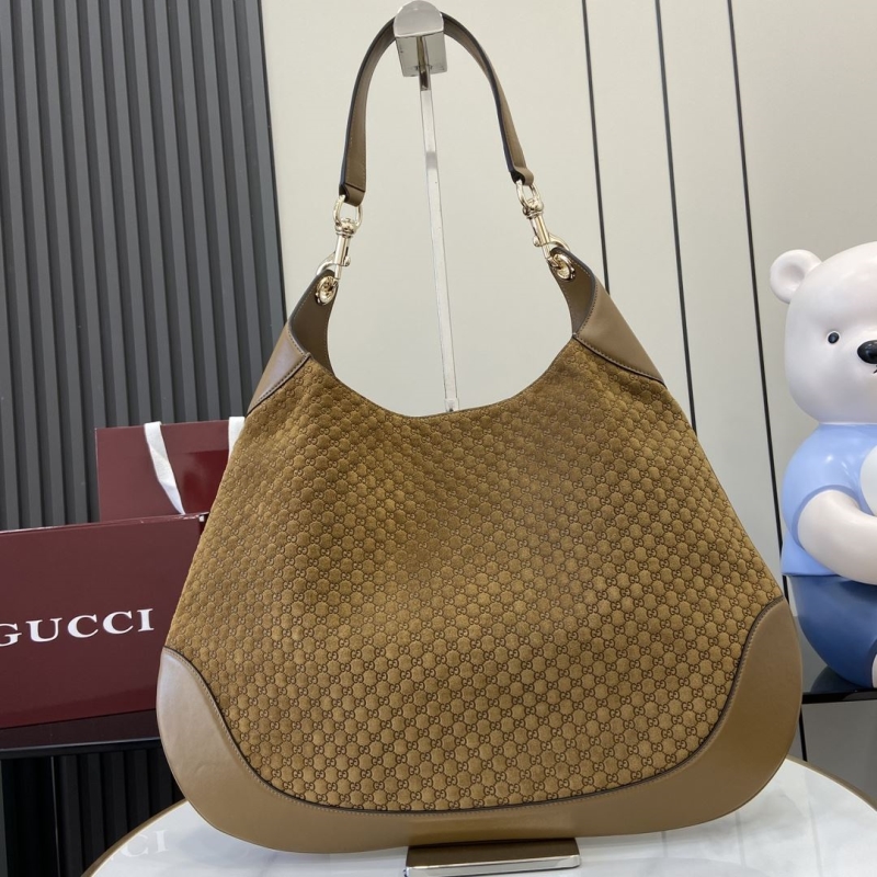 G*u*i top handle bags